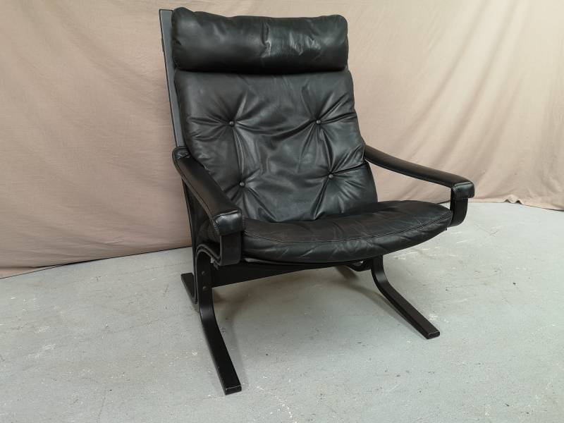 a vendre fauteuil design cuir noir style vintage scandinave à Paris